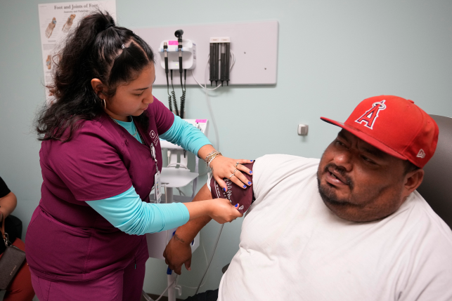 Patient gets blood pressure taken