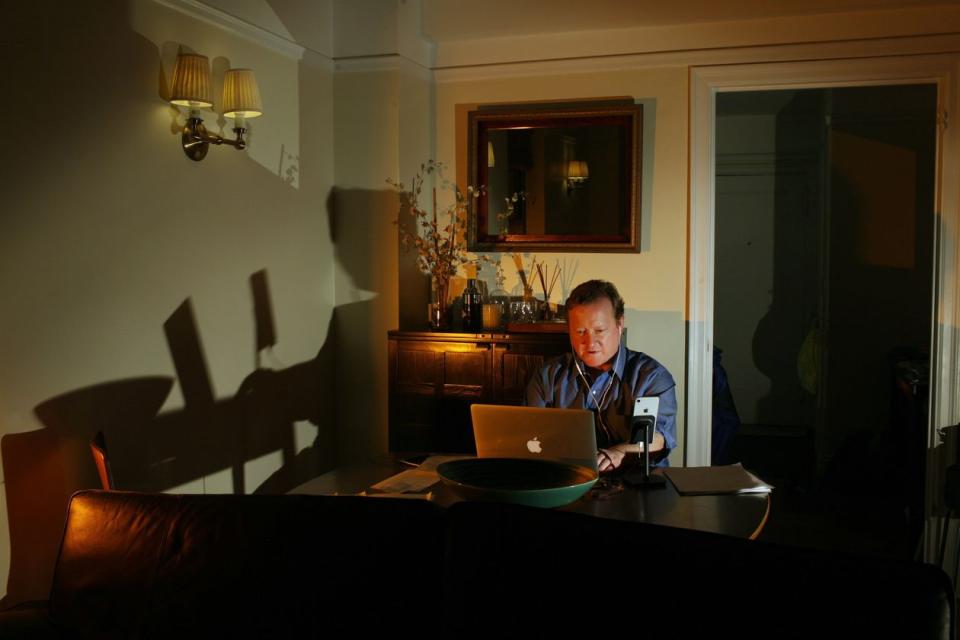 Dr. Christopher Woodrell works from home as he coaches Mount Sinai workers who face tough conversations with coronavirus patients.