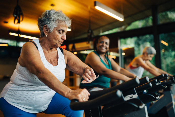 Seniors on exercise equipment