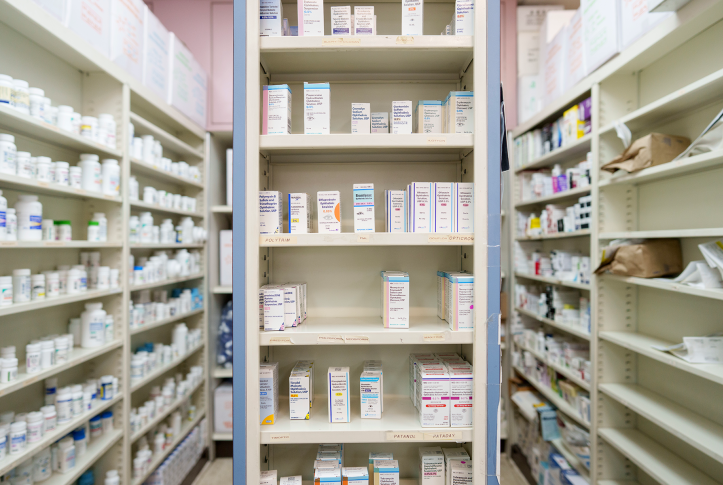 Shelves of pharmacy stocked with medication